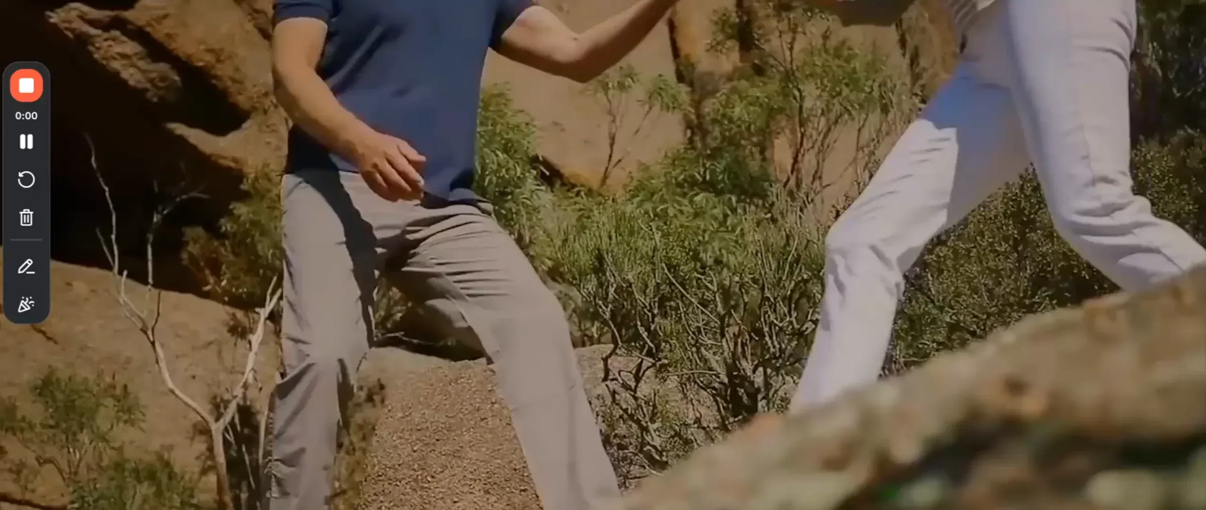 Two travellers walking through the Australian outback