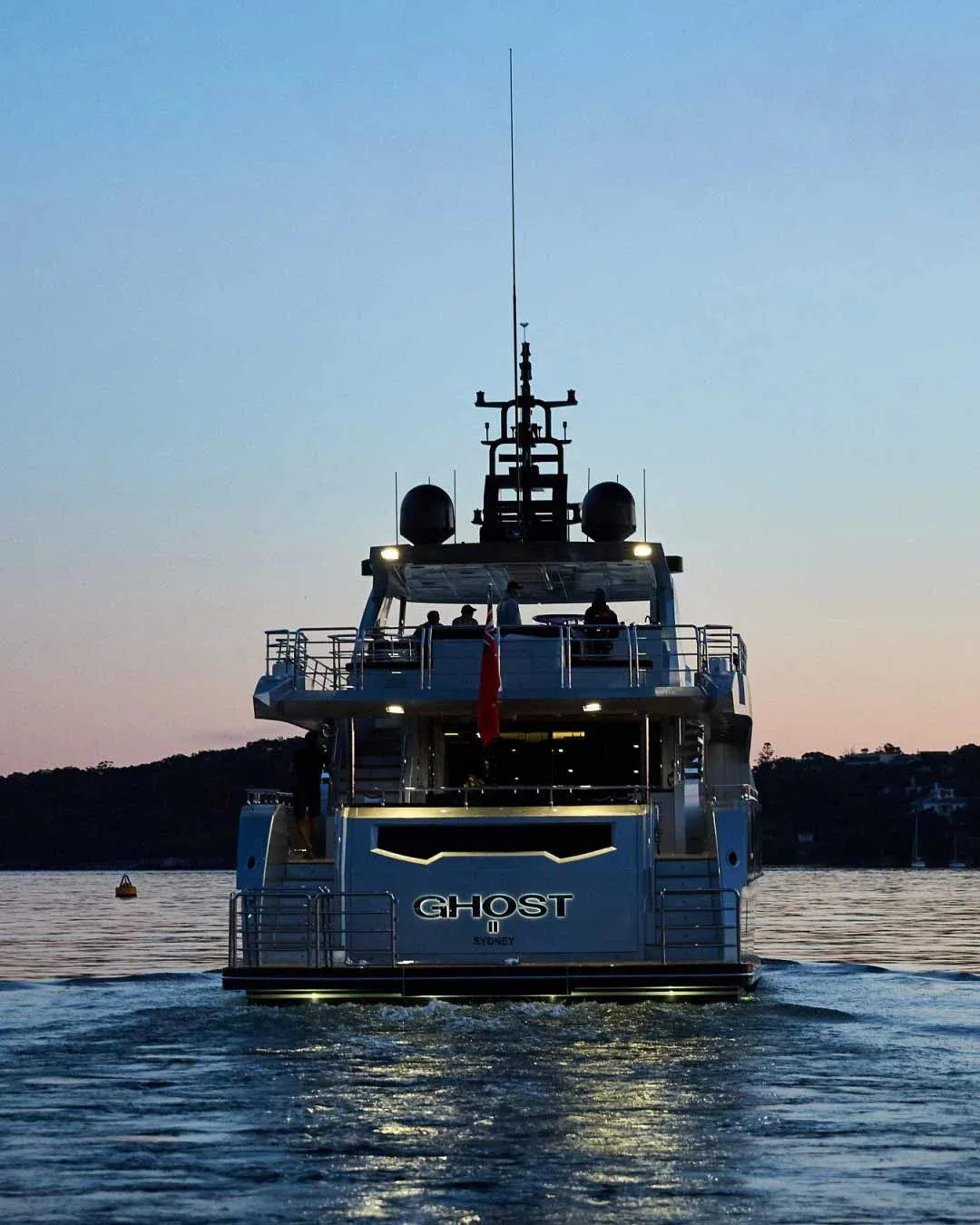 Superyacht at anchor at dusk